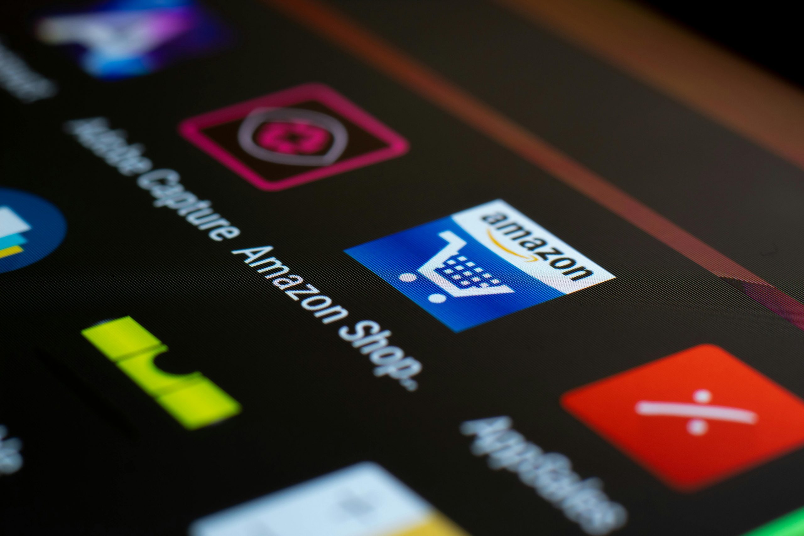 close-up of the Amazon app icon on a smartphone screen
