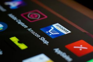 close-up of the Amazon app icon on a smartphone screen